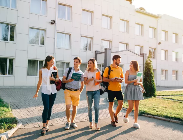 free-time-students-bachelor-s-campus-life-rhythm-five-friendly-students-are-walking